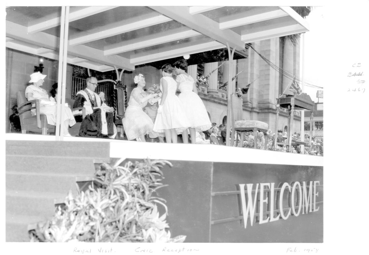 Her Majesty Queen Elizabeth The Queen Mother receiving flowers at civic reception, Brisbane, February 1958