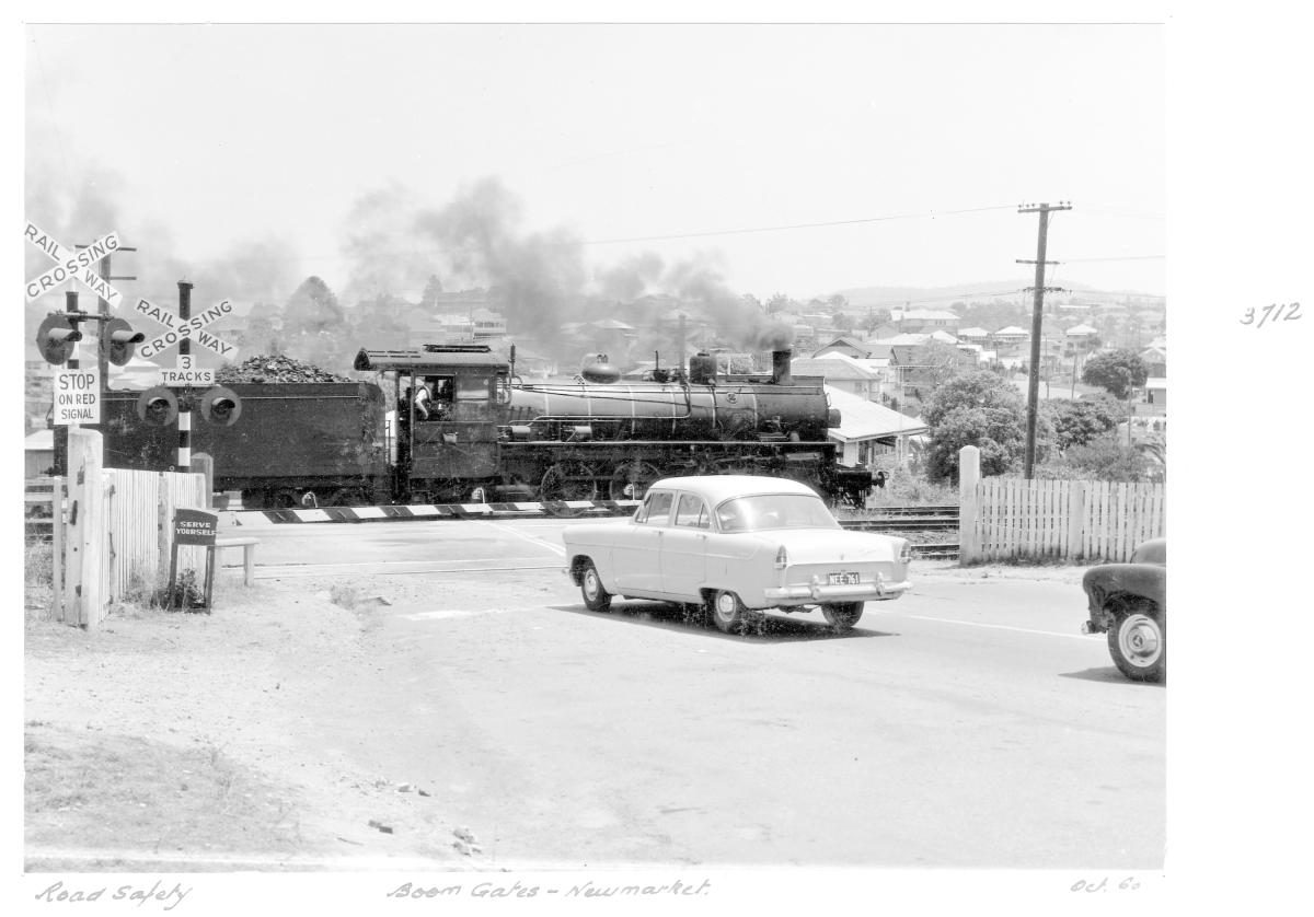 Boom gates and train crossing at Newmarket - Brisbane, October 1960
