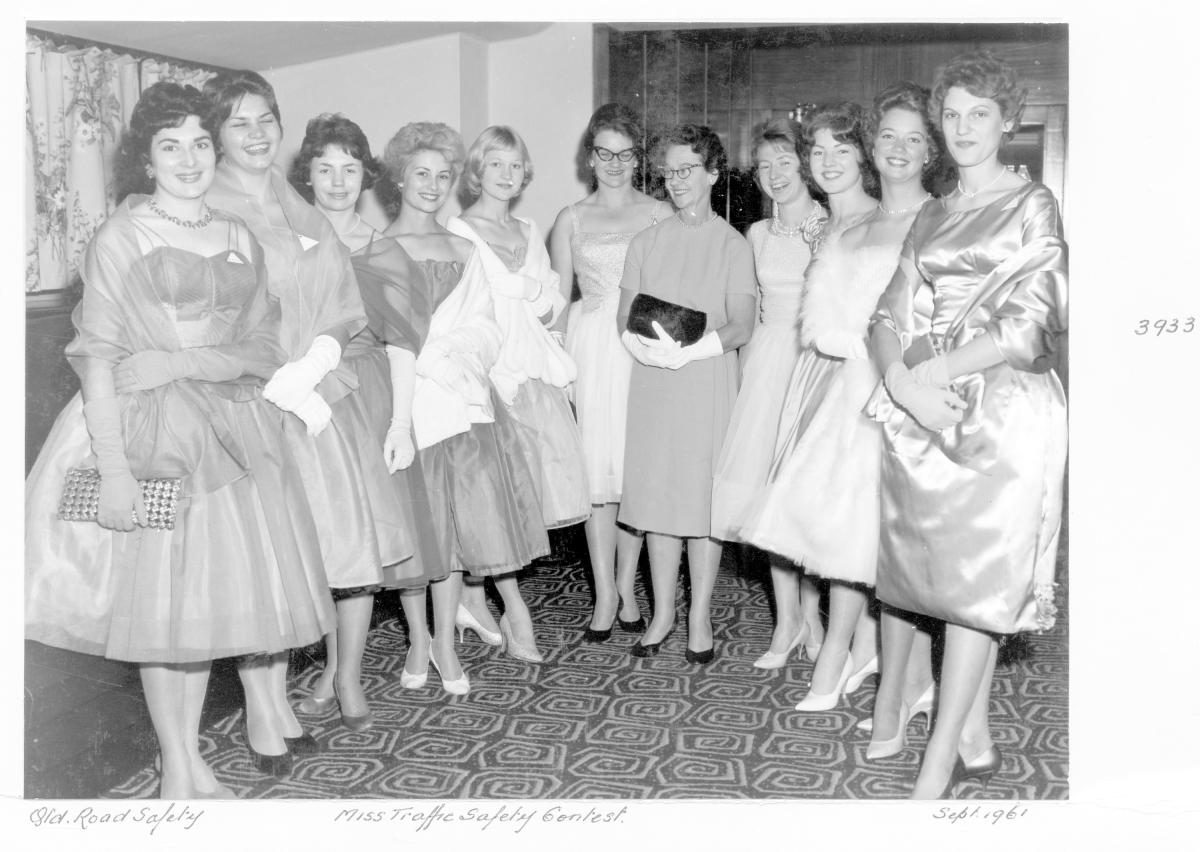 Miss Traffic Safety Quest 1961 contestants in evening dress, with guest - Brisbane, September 1961