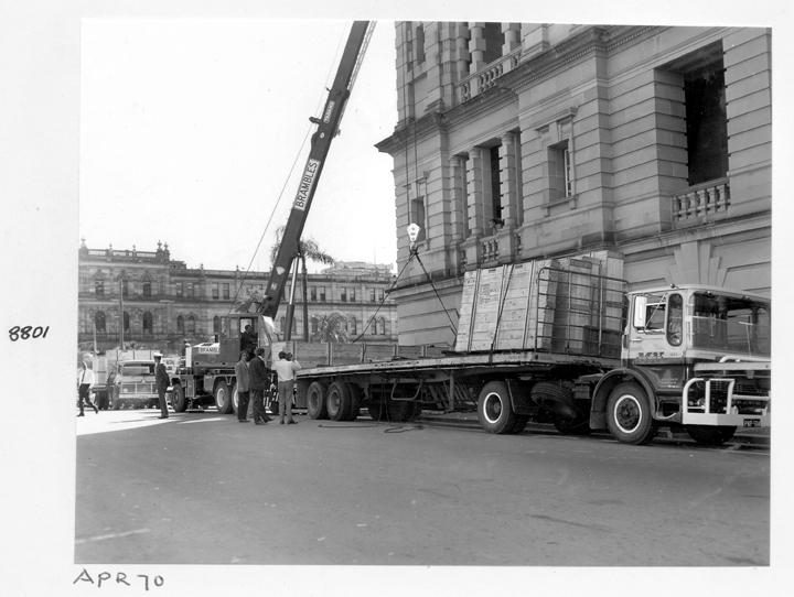 Camera main beam being unloaded, William Street, Brisbane, April 1970