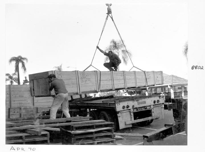 Camera main beam being unloaded, William Street, Brisbane, April 1970