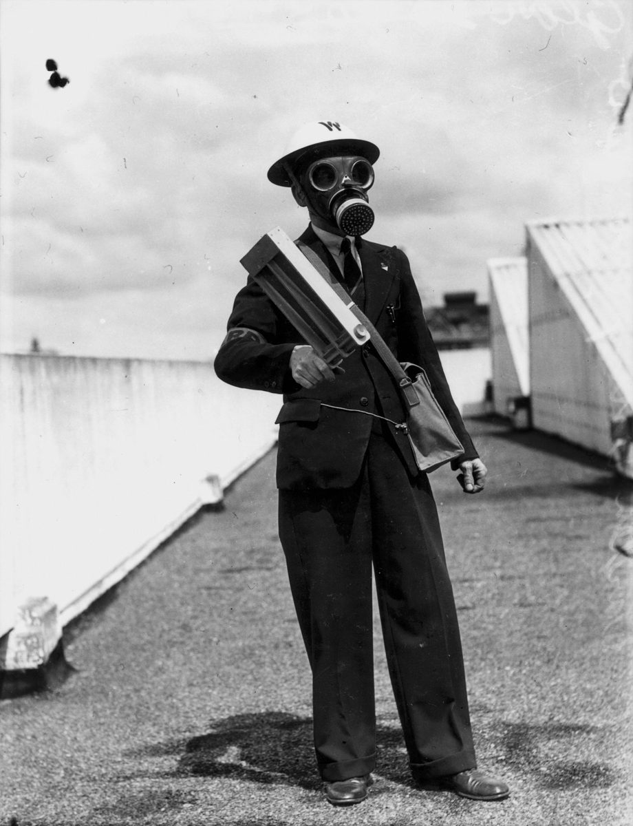 Air Raid Warden testing new equipment in Brisbane, October 1942 JT testing