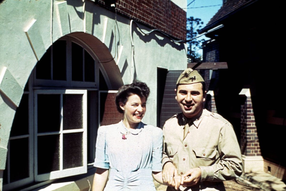 Teletype operator, Olga Honey, with assistant signal officer American Lieutenant Mark Muller outside Somerville House in Brisbane, 1942
