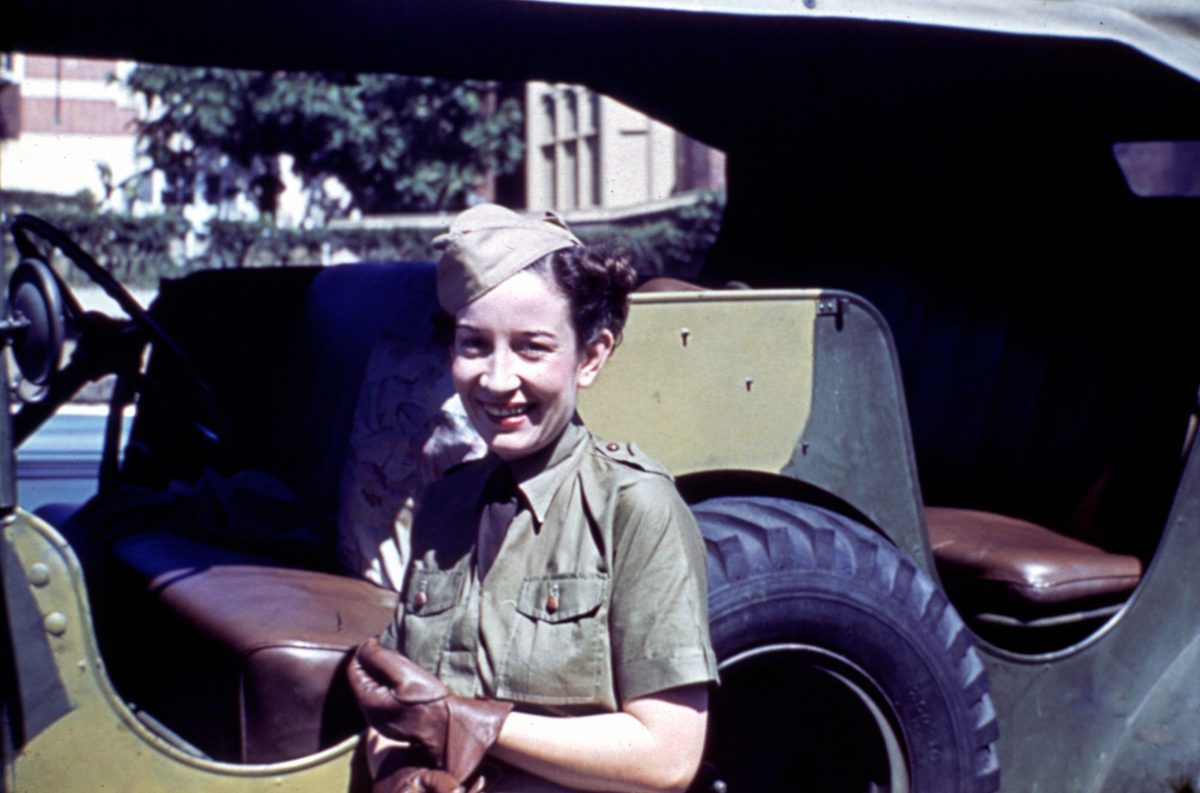 Women's National Emergency Legion driver, Miss Tony Mitchell, at Somerville House in Brisbane, 1942