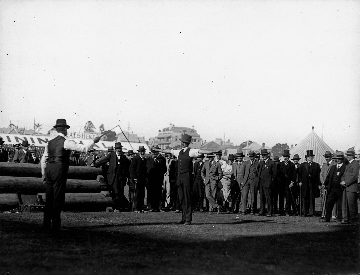 Edward, Prince of Wales watching a whip-cracking demonstration at the Brisbane show, July 1920