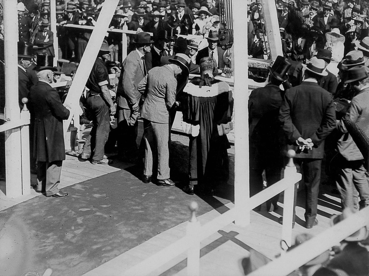 Close-up of His Royal Highness Edward, Prince of Wales, laying the foundation stone for the new Town Hall, Brisbane, July 1920