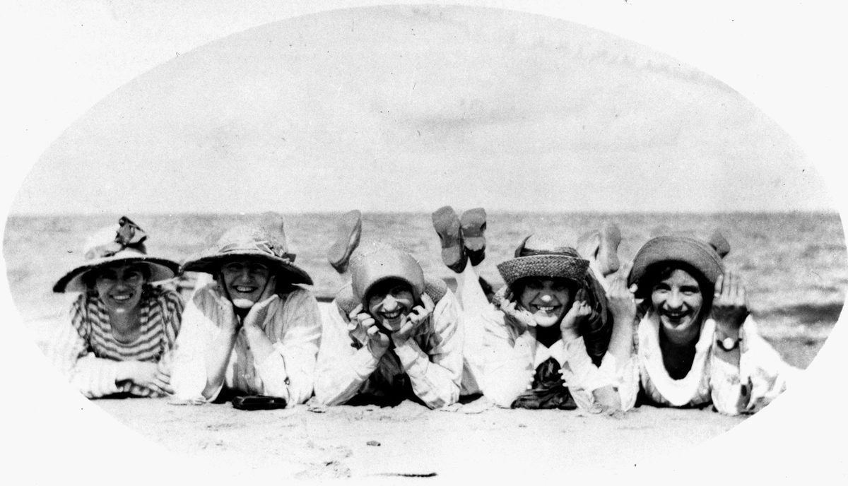 Five young women pose on the beach at Woody Point, Redcliffe, 1919