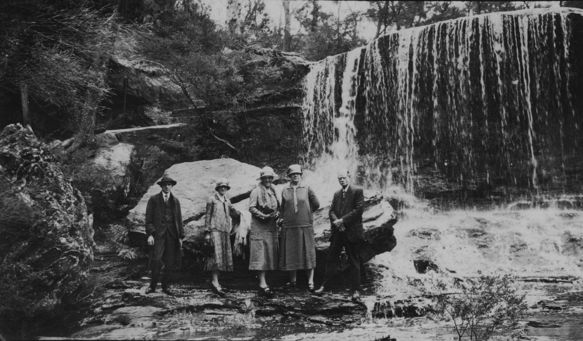 Lovelock family with friends at the waterfall, Mt. Cootha area, Brisbane, 1926