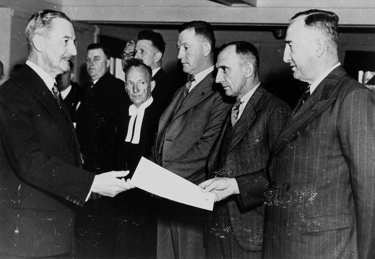Sir Leslie Orme Wilson at a function at Government House, Brisbane, 1945