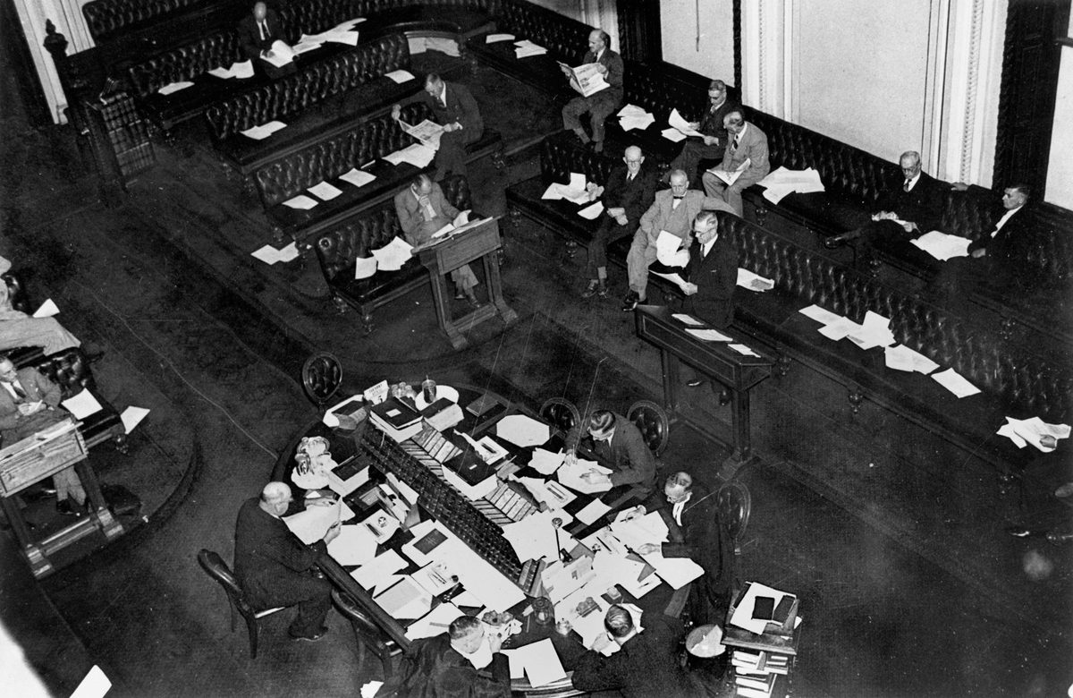 Premier Hanlon delivering the budget to Parliament in 1948