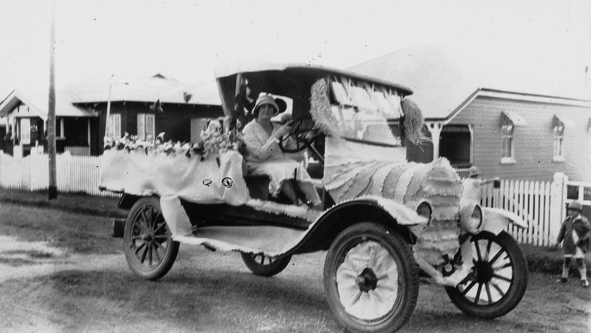 Decorated motor vehicle celebrating the dedication of St Andrew's Church of England, Lutwyche, Brisbane, 1926