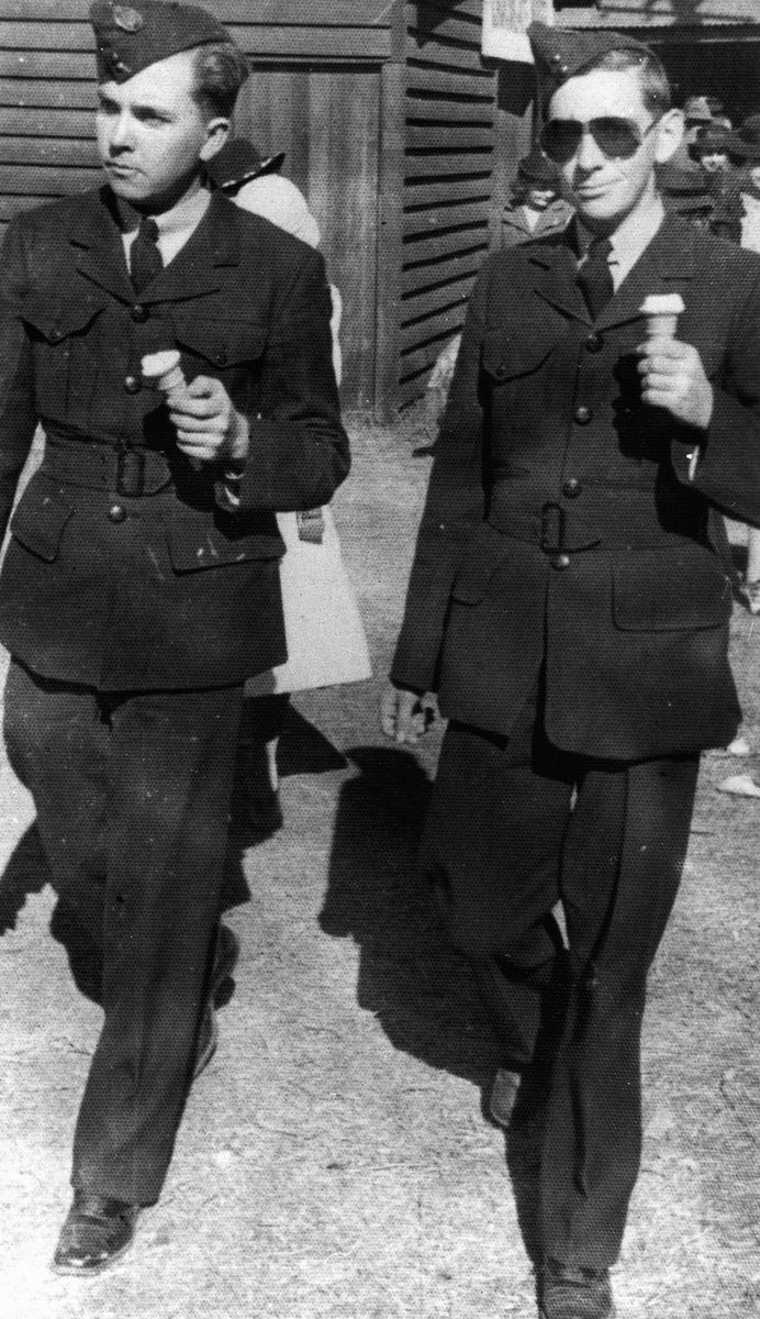 Two young airmen enjoying icecreams at the Exhibition, 1941