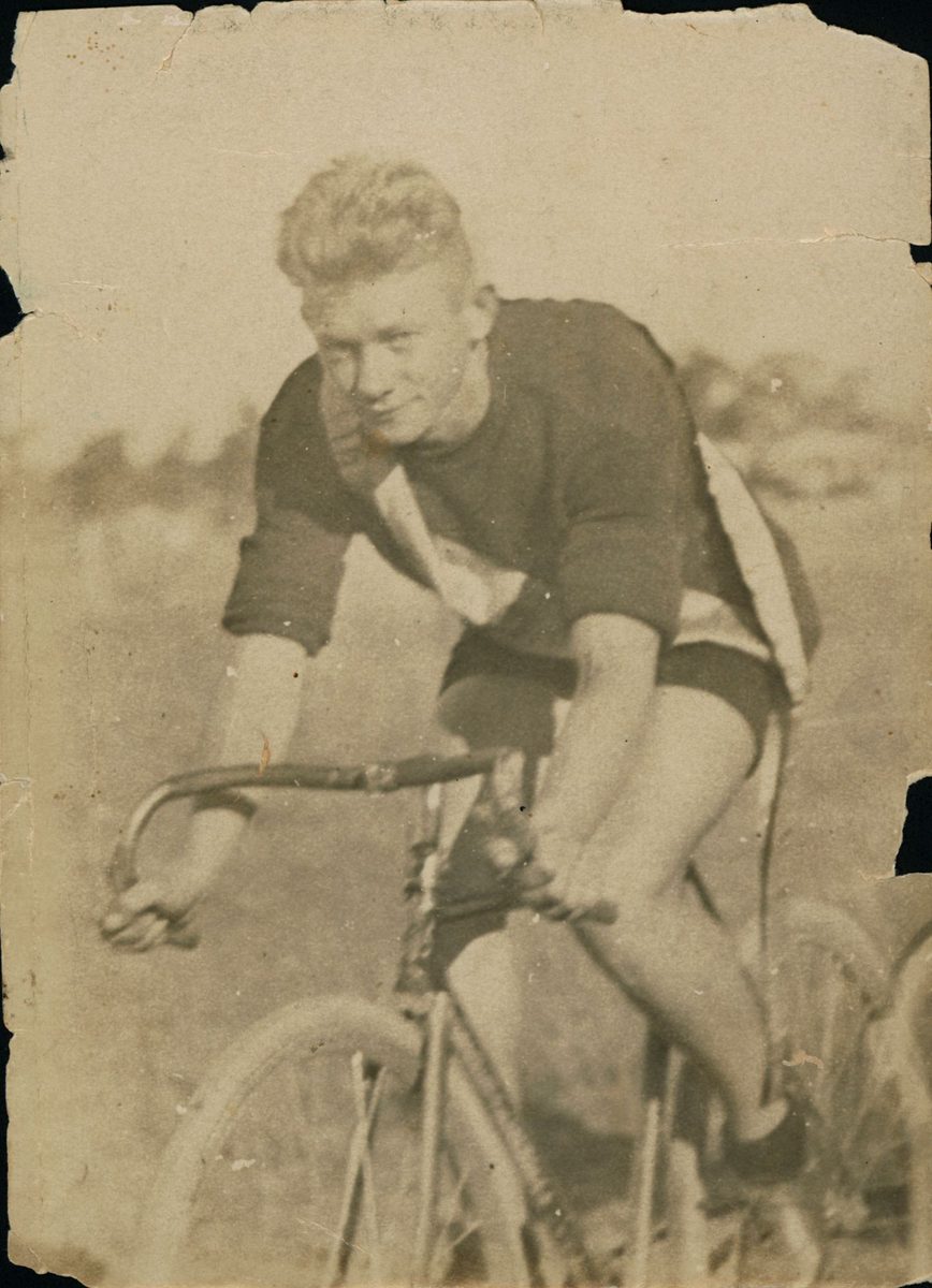 S. Goubaroff on his bicycle, Kangaroo Point, Brisbane, 1926