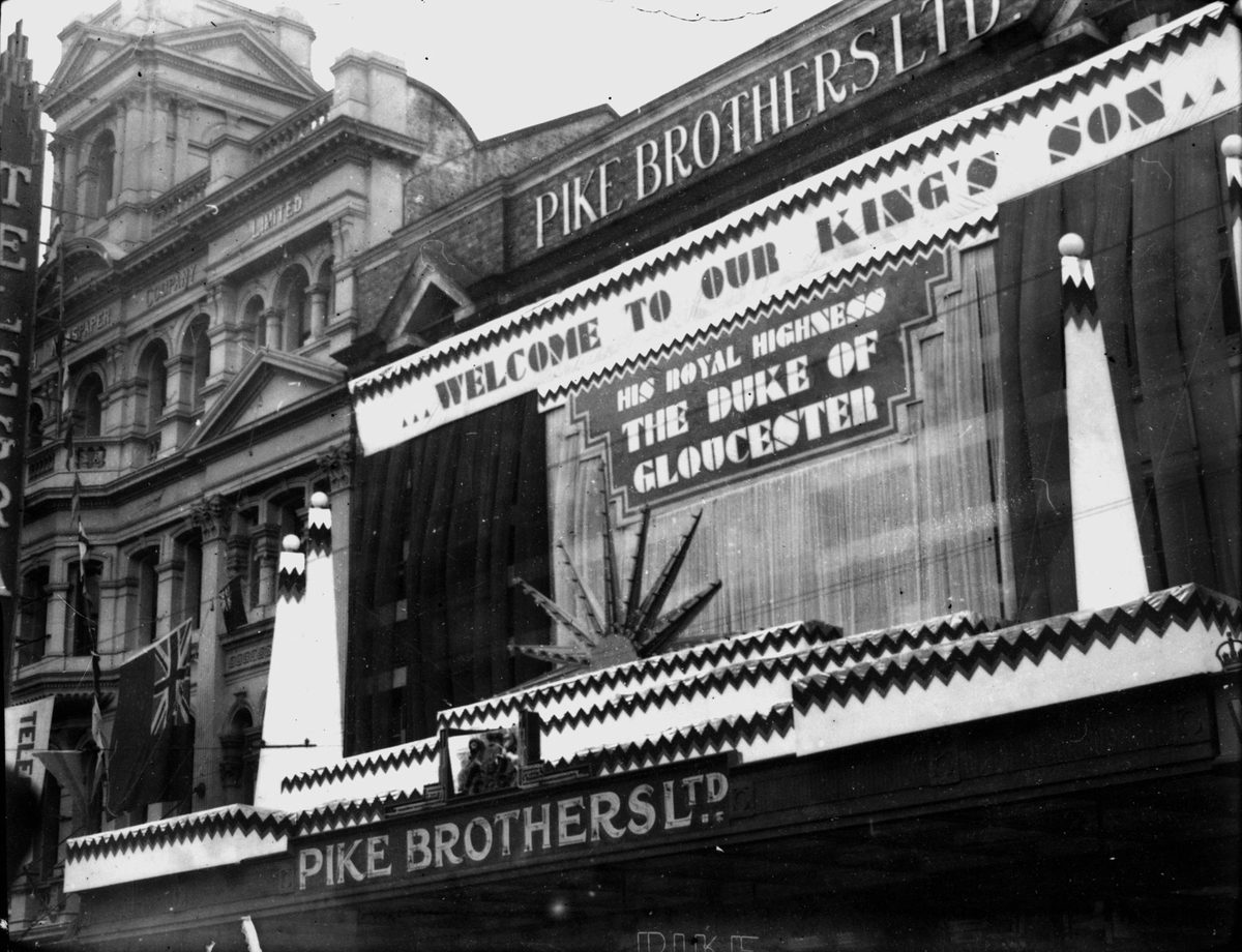 Banner welcoming His Royal Highness, The Duke of Gloucester, outside Pike Brother's building in Brisbane, 1934
