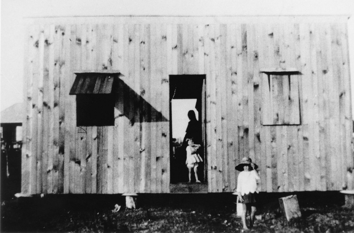 Simple timber house on stumps located on Cribb Island, 1925