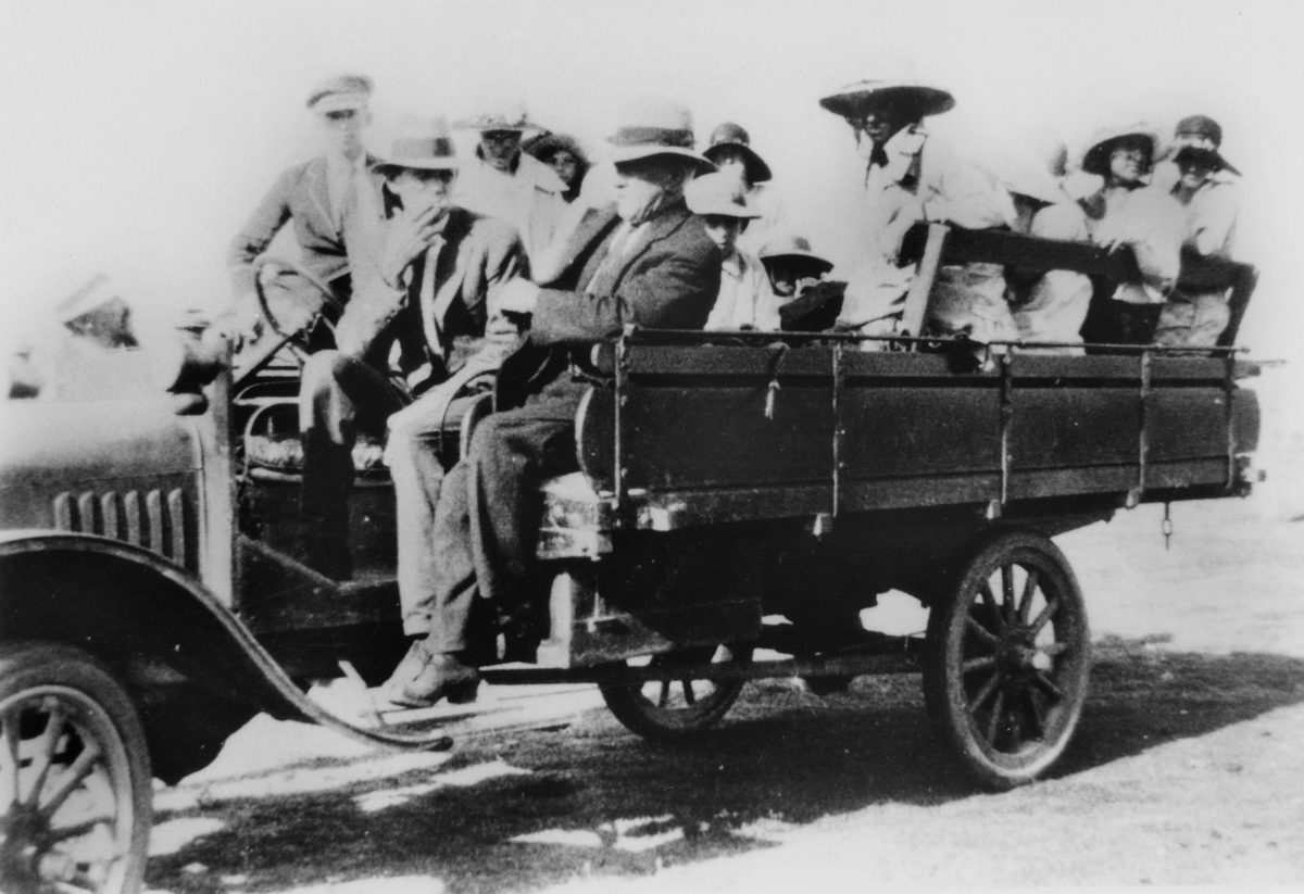 Truck load of people enjoying a day out at Cribb Island, 1926