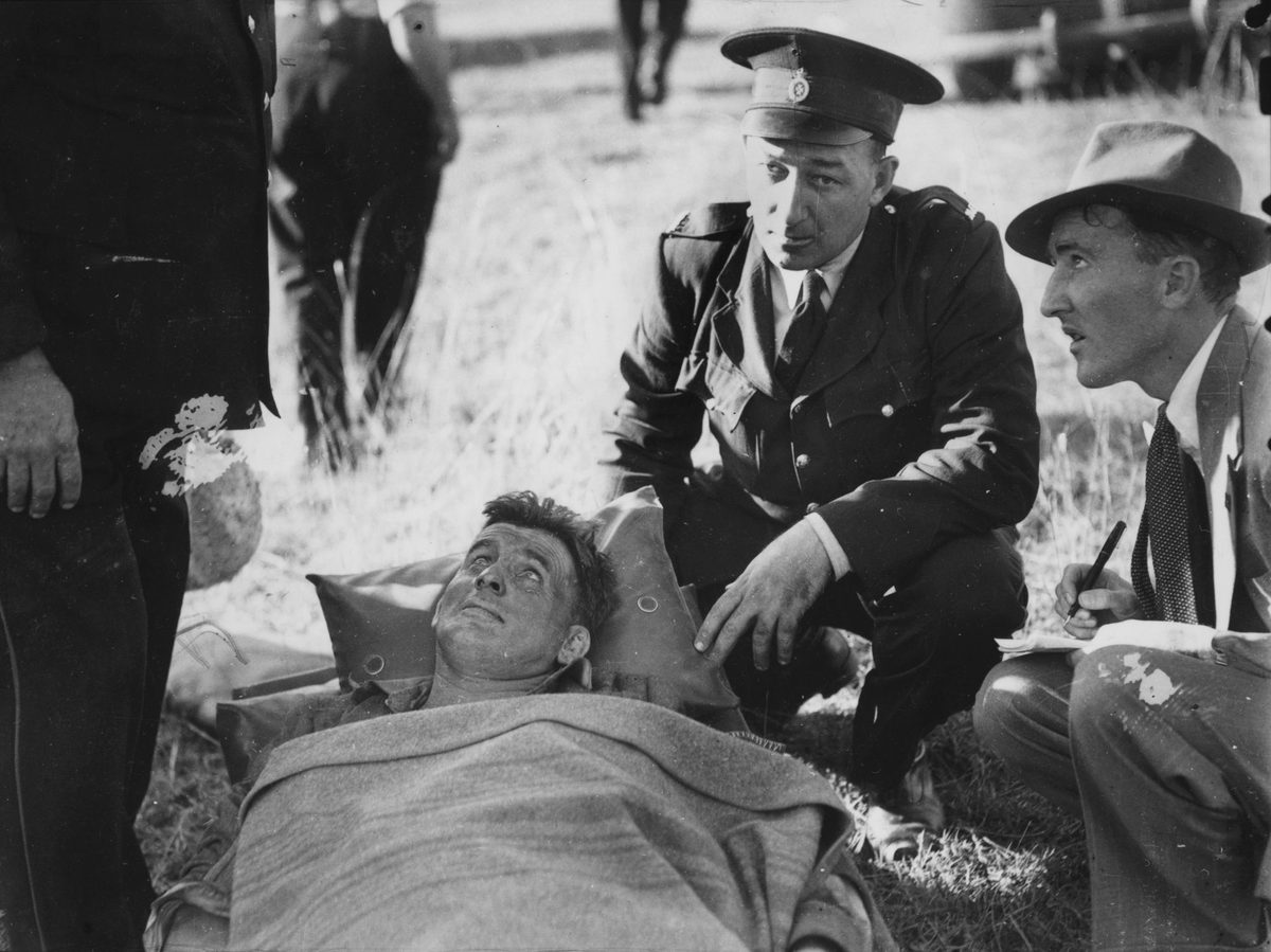 Male survivor being interviewed at the scene of the Camp Mountain train disaster, 1947