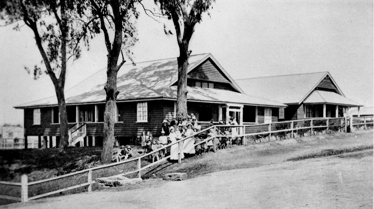 Staff and children of the creche at Paddington, 1918