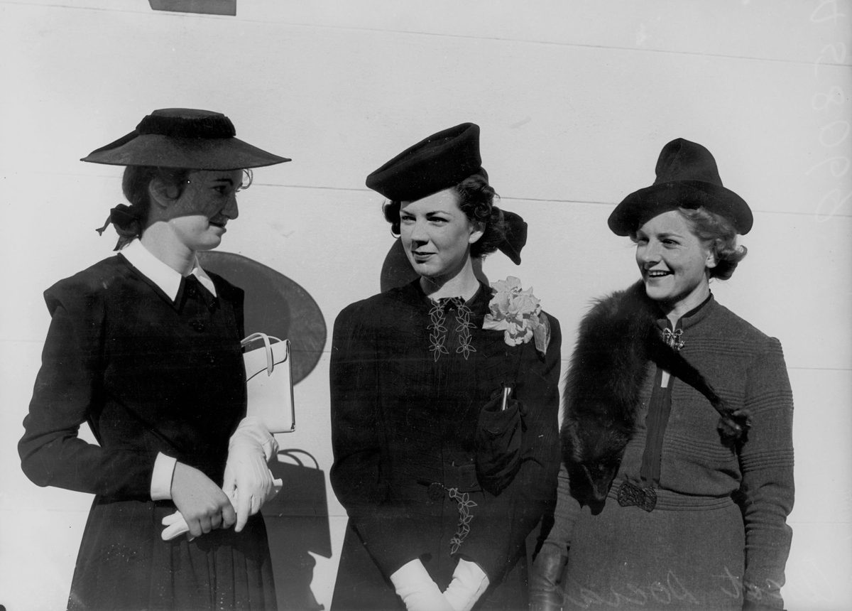 Joan Haynes, Peggy Allen and Mrs W. D. Hardham enjoying a day out at Ascot races, Brisbane, 1939