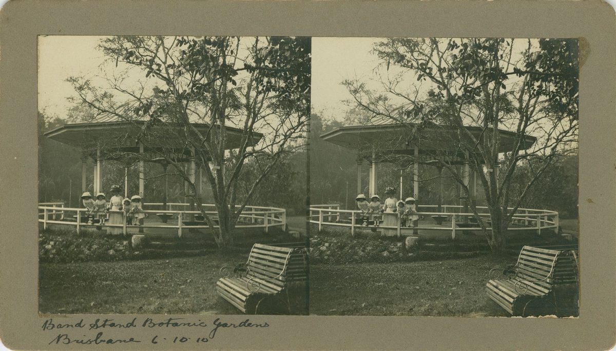 Woman and children posing inside the bandstand, Brisbane Botanic Gardens, 1910