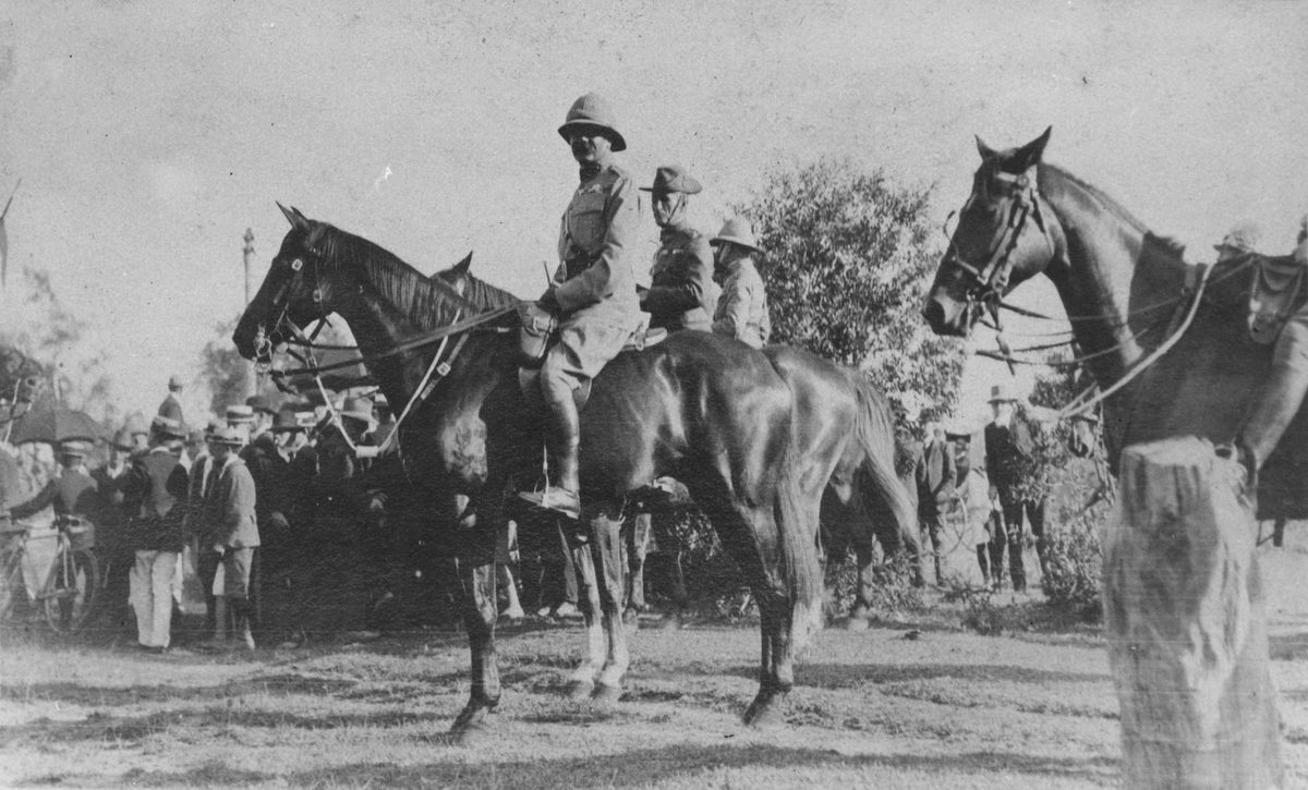 Lord Kitchener on horseback with Major General J. C. Hoad and Col. Lyster