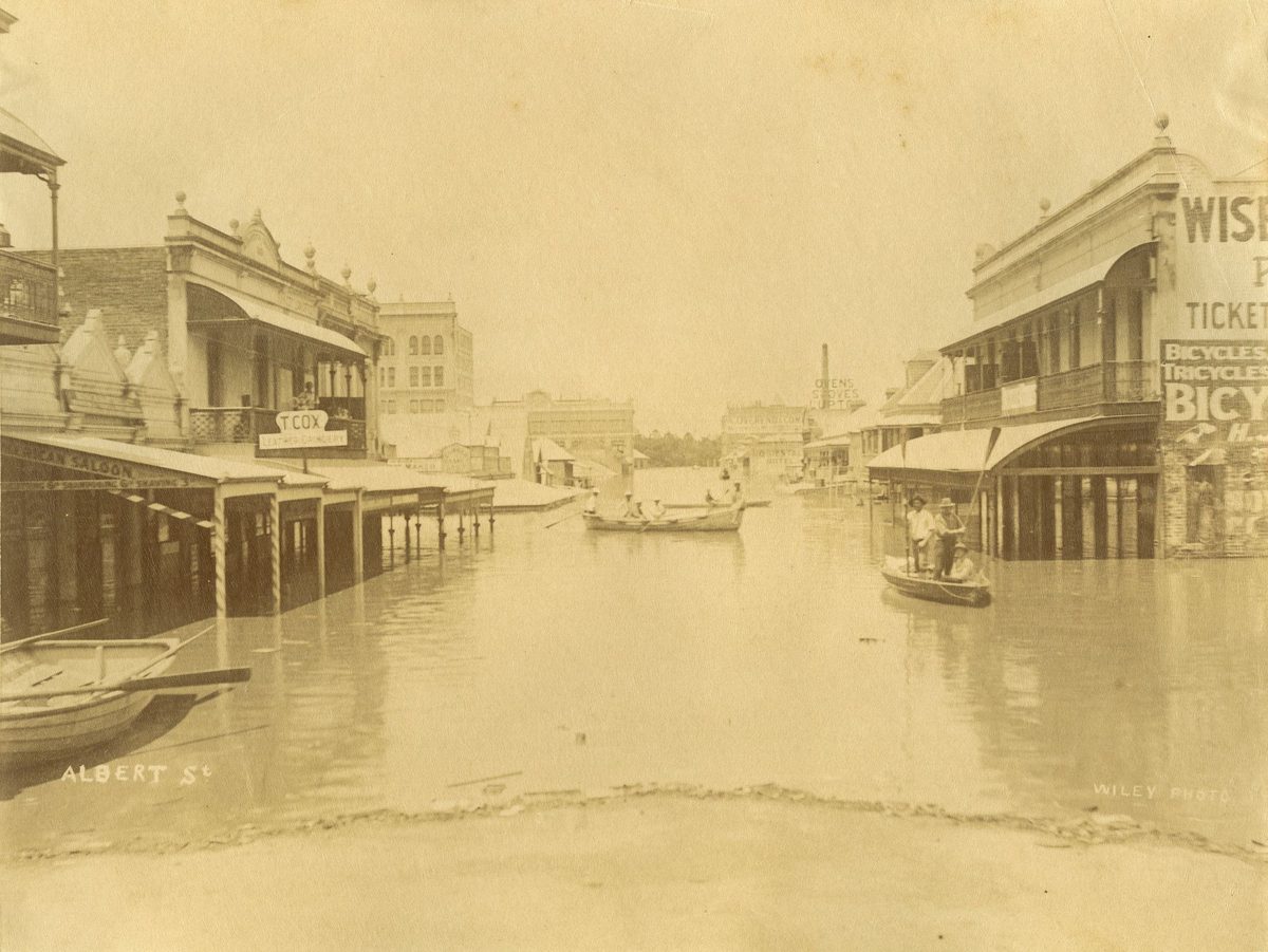 Boats plying up and down Albert Street in the City of Brisbane, during the 1893 floods