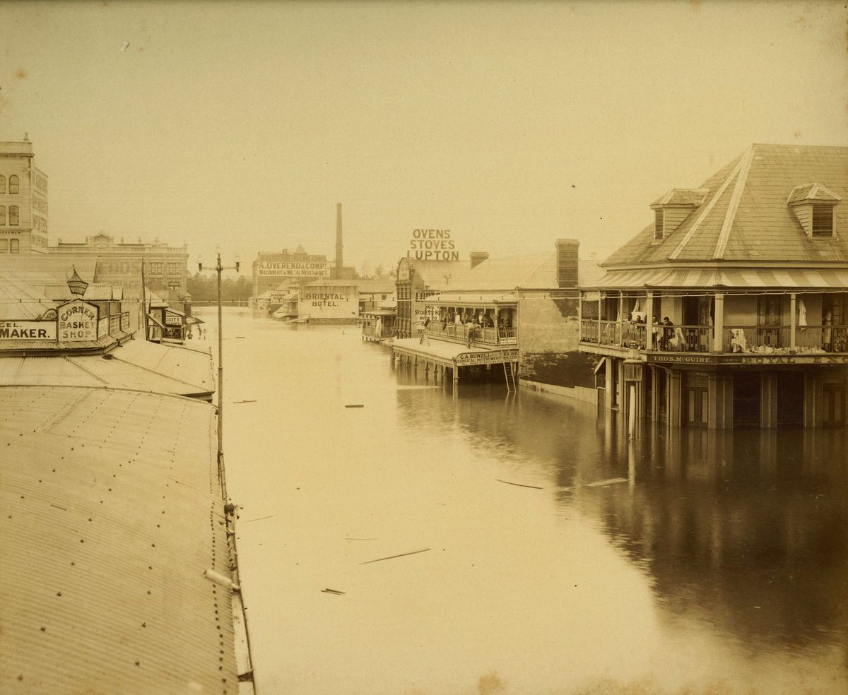 Looking down flooded Albert Street towards the Oriental Hotel, 1893