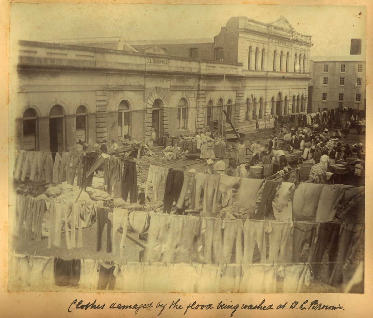 Workers washing clothes damaged in the flood, Brisbane, 1893