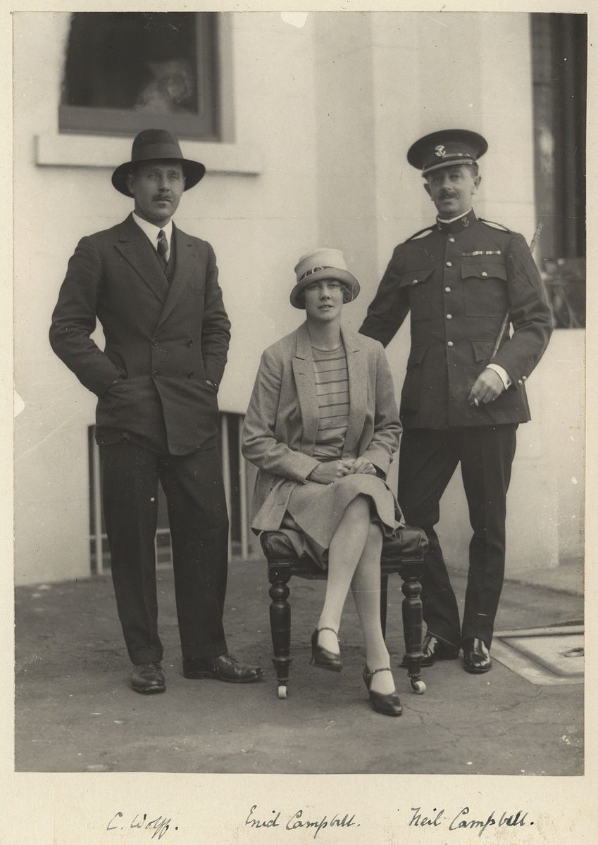 Enid and Neil Campbell and C. Wolff, staff of the Queensland Governor, Sir John Goodwin