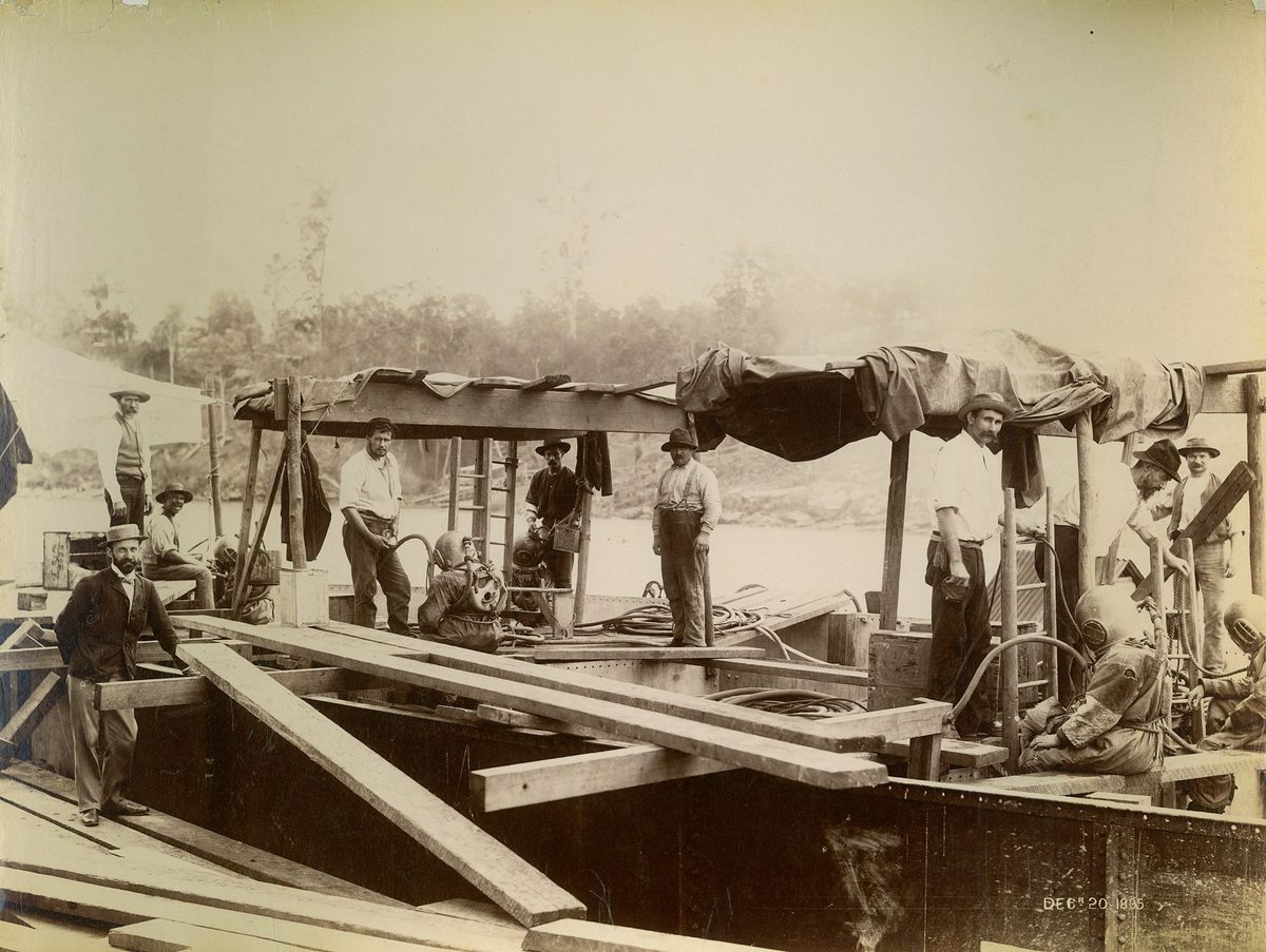 Divers on the steel cassions during the construction of the Indooroopilly Railway Bridge, 1895