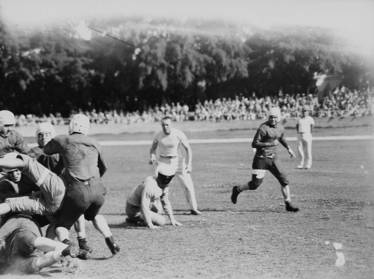 Action at the gridiron football match held in Brisbane