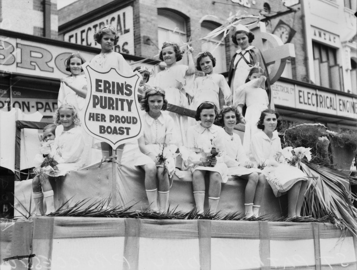 Young girls posing on a St. Patrick's Day parade float, Brisbane, 1940