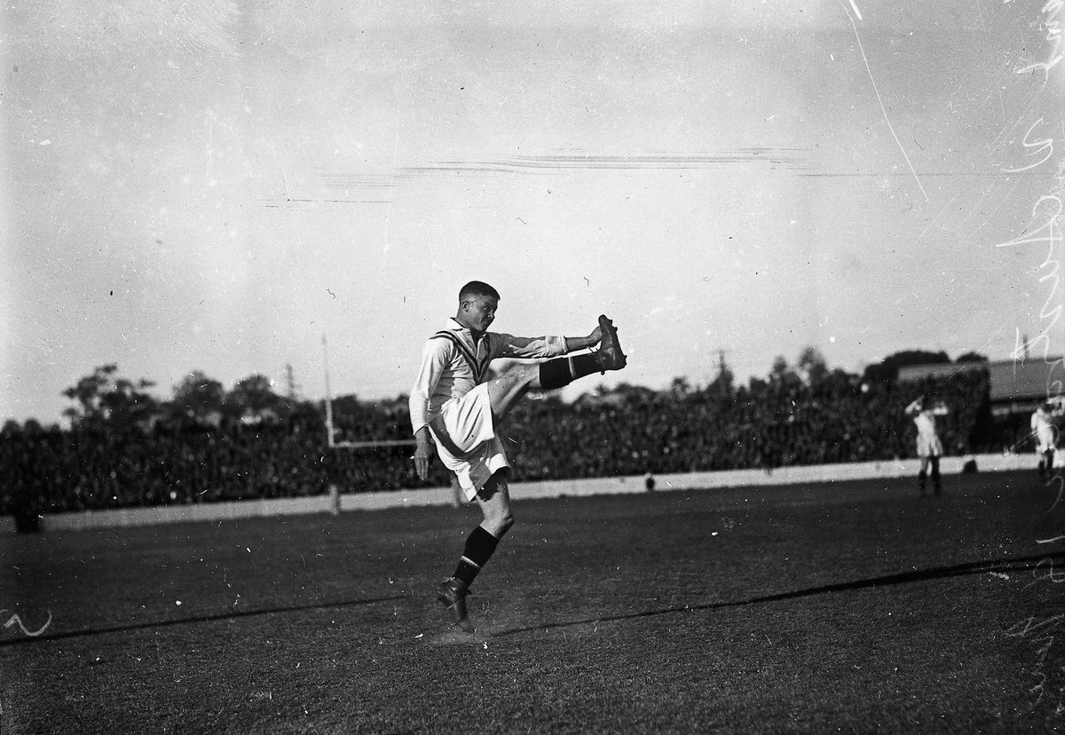 Sullivan kicking for England, in a Rugby Union match against Australia, 1933