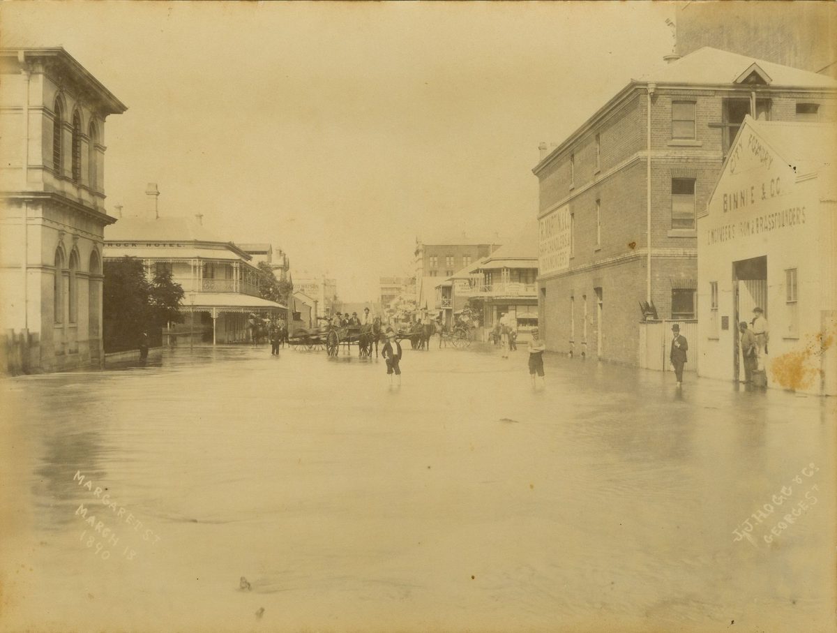 People standing in flooded Margaret Street, Brisbane, 1890