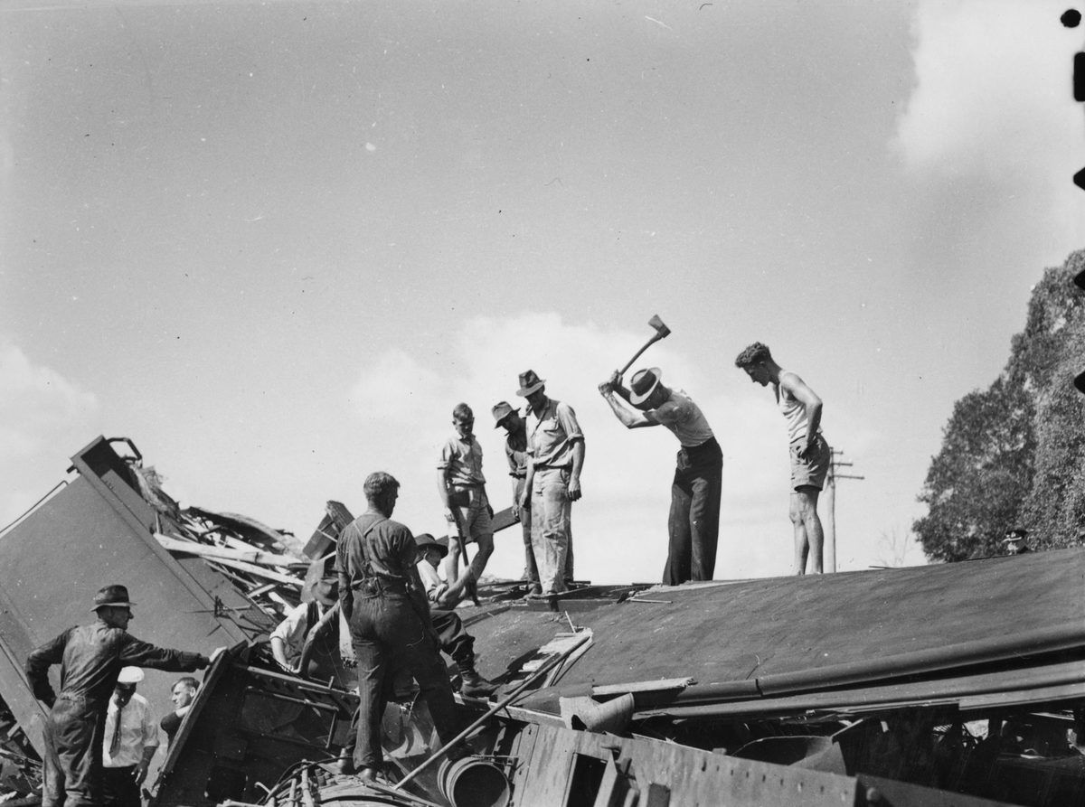 Workers at the scene of the Camp Mountain train disaster, 1947