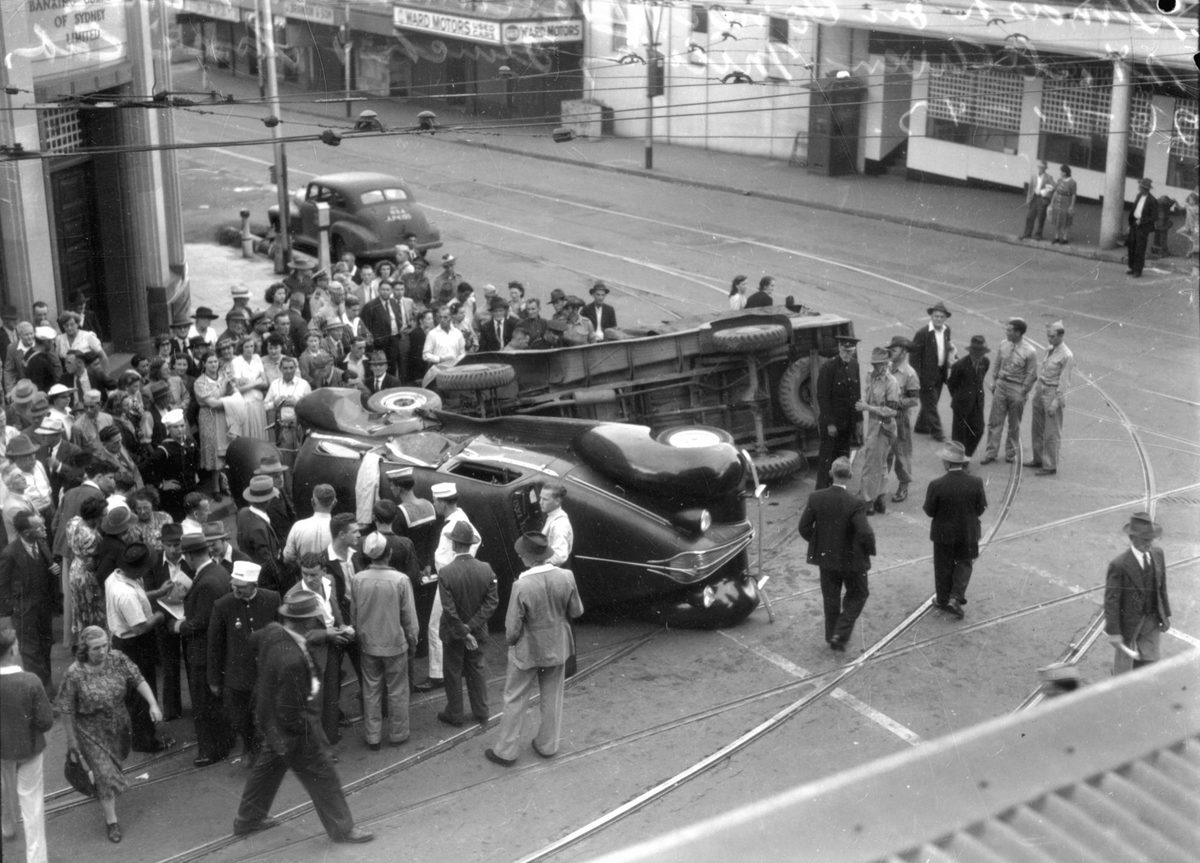 Brisbane city street accident involving a Hudson Terraplane and a Ford utility, 1943