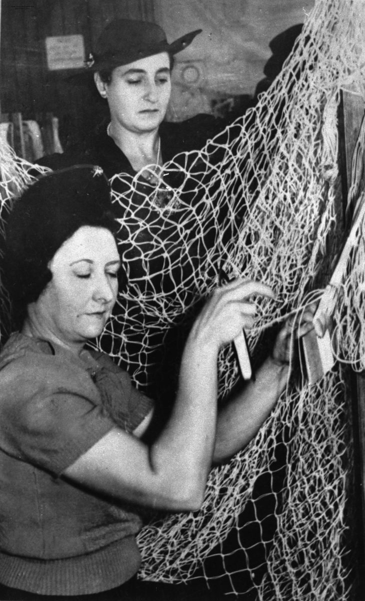 Women making camouflage nets for the war effort, 1941