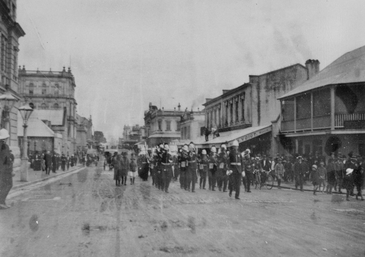 Military procession marching along George Street at the opening of Parliament, Brisbane, 1912