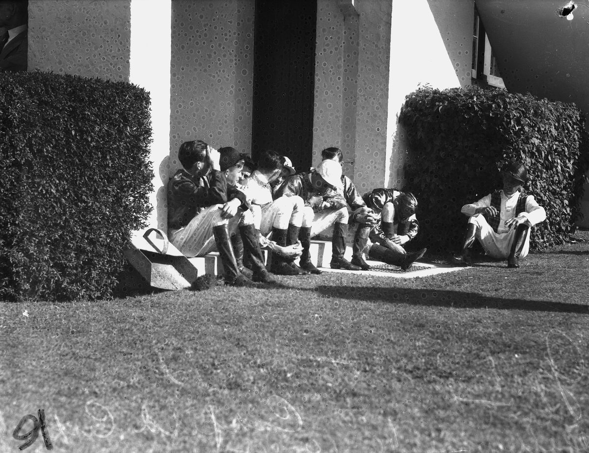 Jockeys listening to the Caulfield Cup, 1948