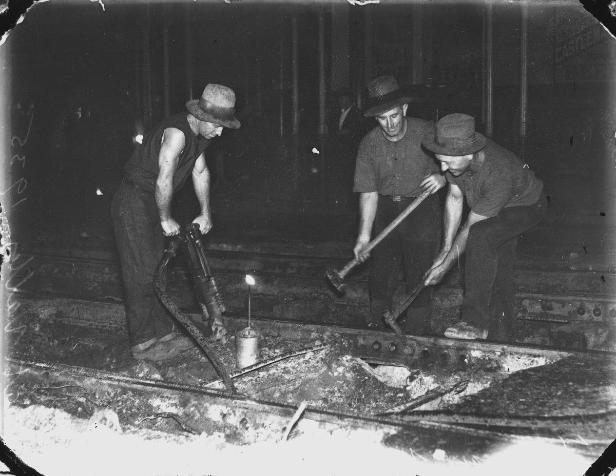 Tramway men re-laying tracks at Fortitude Valley, Brisbane, 1935