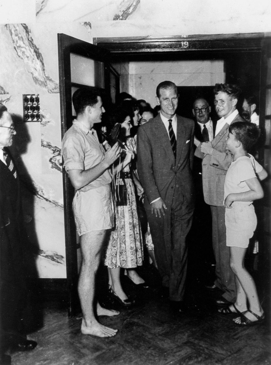 Greeting Prince Philip, Duke of Edinburgh, during the royal visit in 1954
