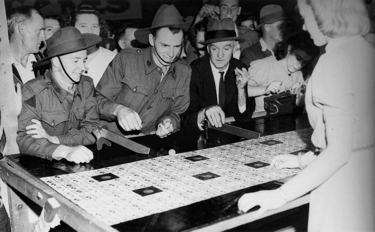 Soldiers playing for a win at a Liberty Week booth, Brisbane, November 1941