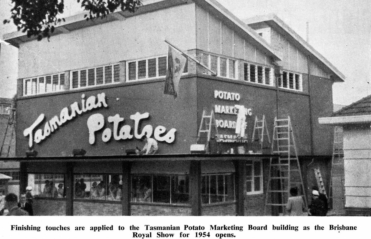 Finishing touches are applied to the Tasmanian Potato Marketing Board building, Exhibition Ground, Brisbane, 1954
