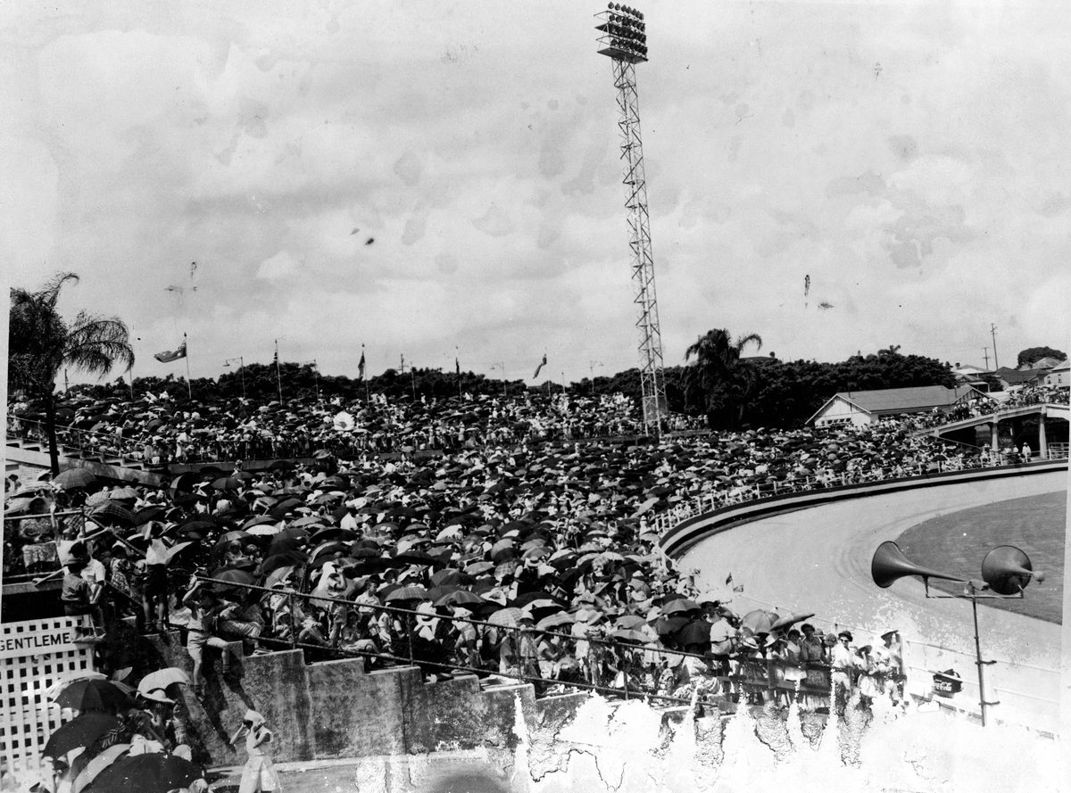 Crowds at Brisbane's Exhibition Grounds awaiting the arrival of Queen Elizabeth II and Prince Philip, March 1954