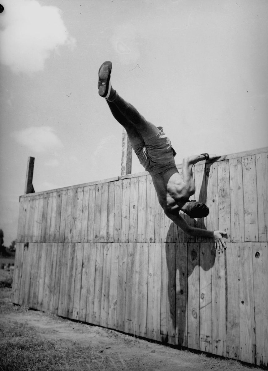 Army recruit is in training at the Army Physical Training School, Brisbane, 1942