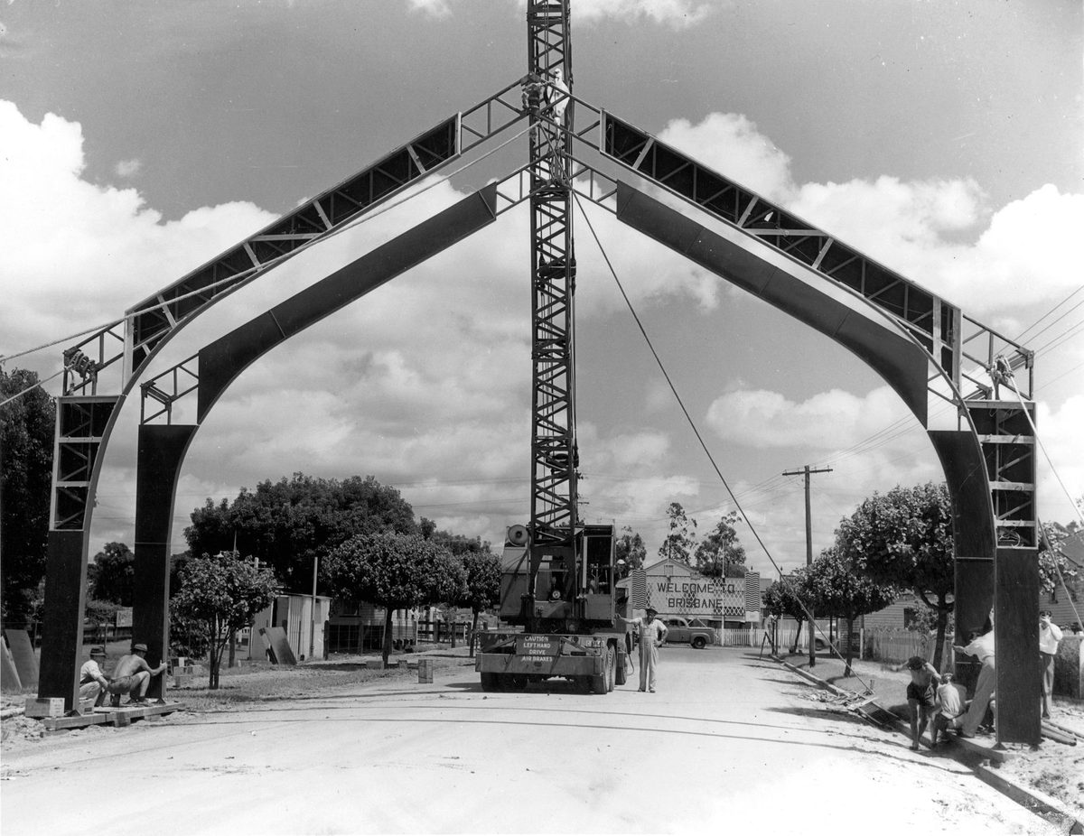 Construction of an archway as part of the street decorations for the Royal Visit in 1954