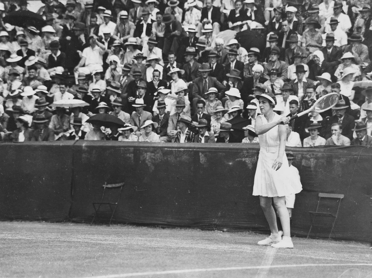 Joan Hartigan competing in a tennis tournament at Milton, 1936