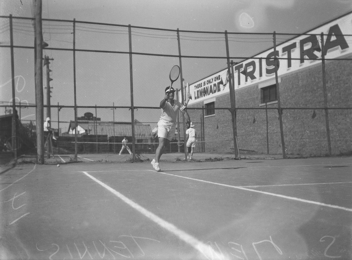 Man playing tennis in Brisbane, 1939