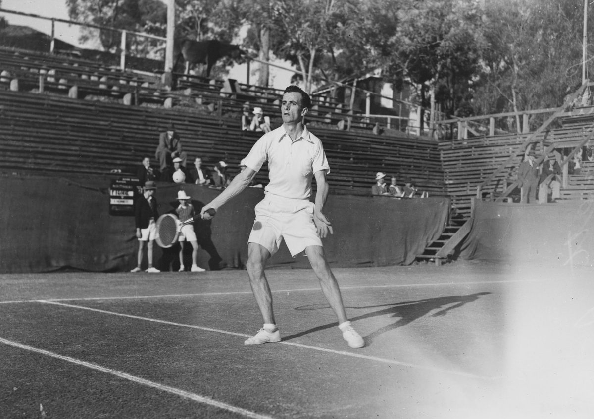 L. Bennett returning a tennis ball in Brisbane, 1939