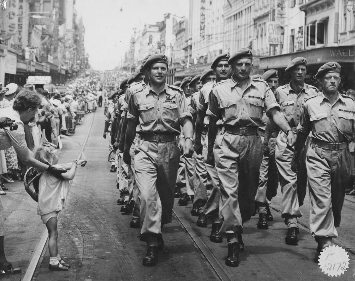 New Zealand troops march through the city, 1951